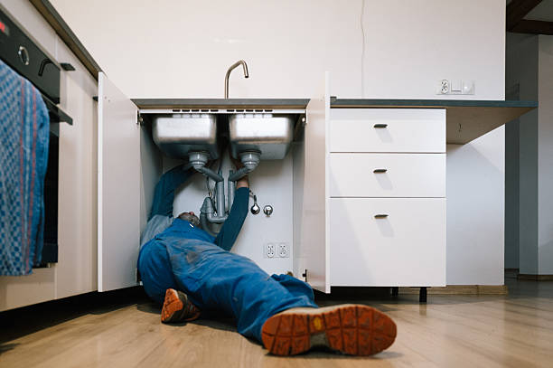 Professional Drain Cleaning technician working in Hurley, WI